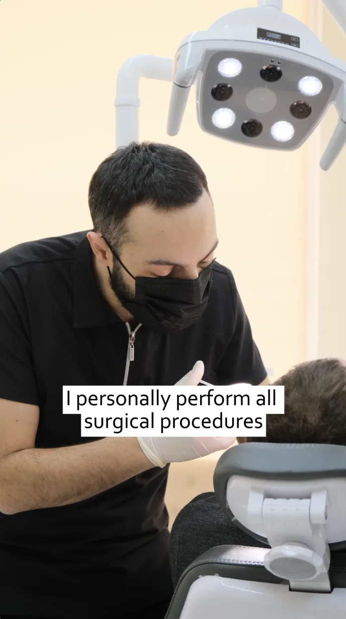Dental surgeon performing a procedure in the clinic